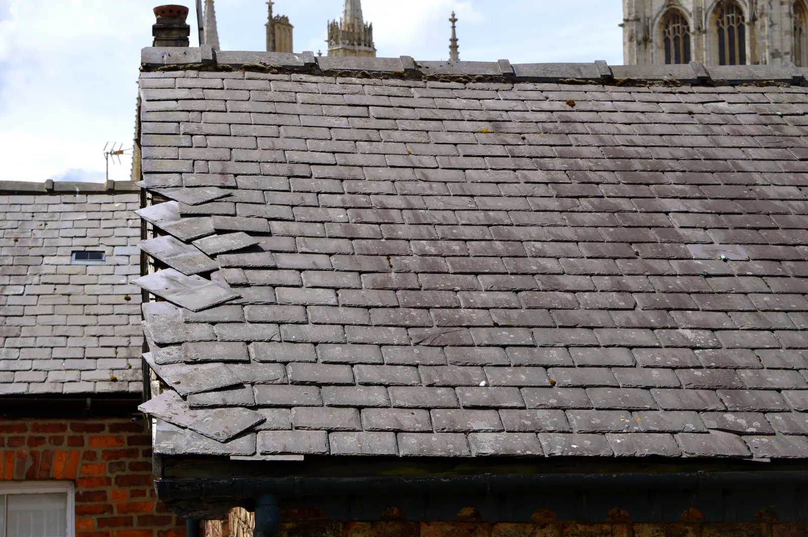 Tiled slate weathered natural slate roof old cottage